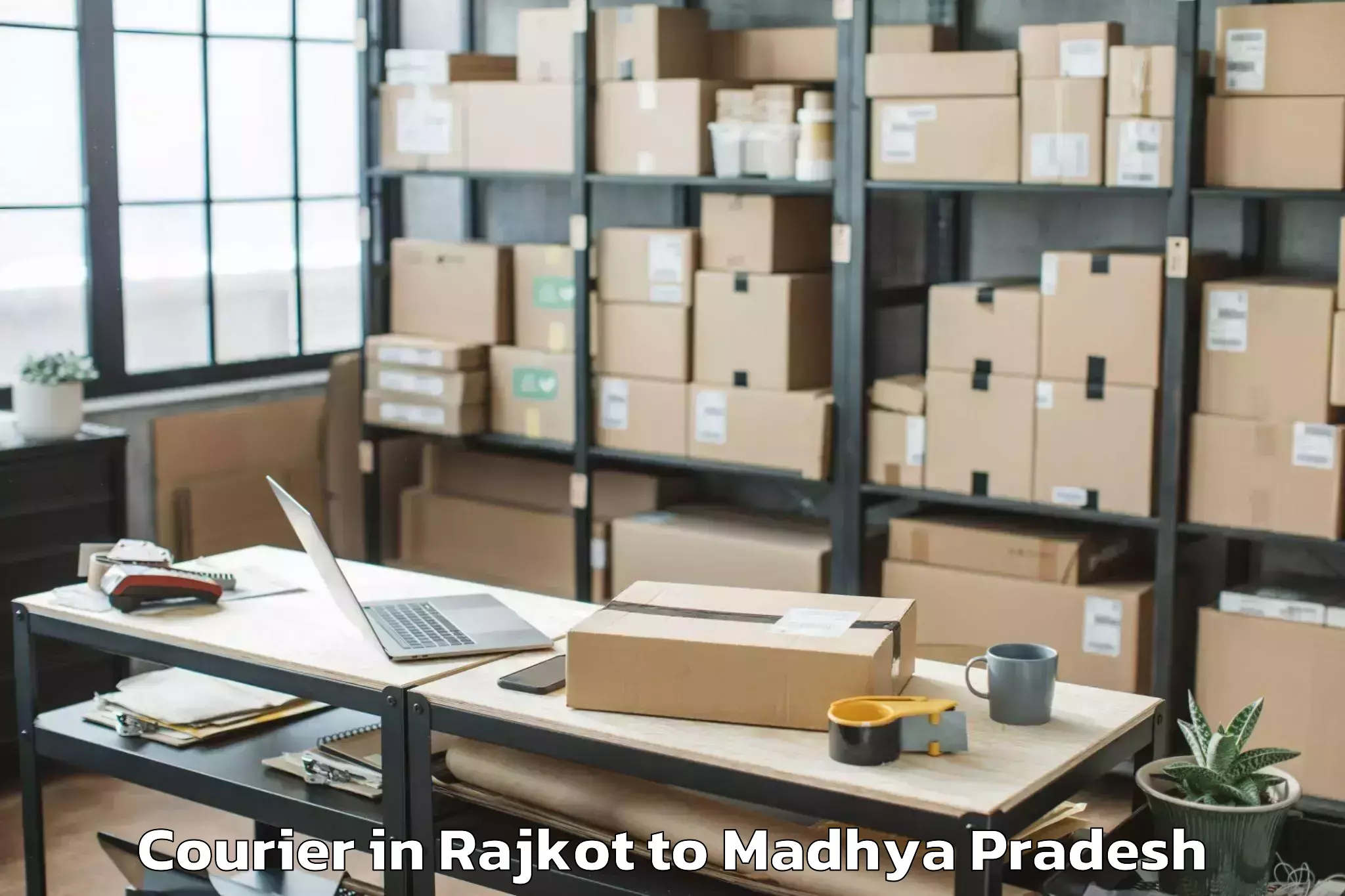 Quality Rajkot to Garhakota Courier